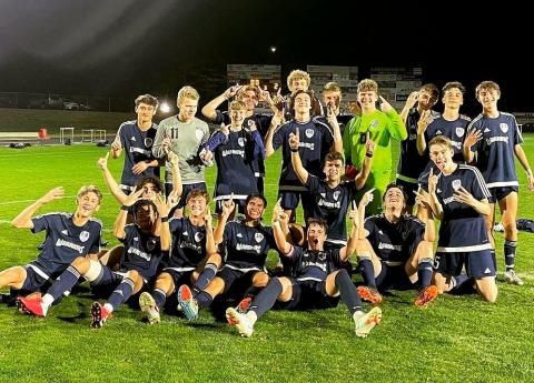The Warriors celebrate following the 2-1 win over West Hall last week at Warrior Stadium. The win clinched the Region 7-AAA title and gives the Warriors the No. 1 seed heading into the Class AAA state tournament, which begins April 21. 