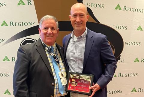 WCHS athletic director Craig Turner, right, is shown with Georgia Athletic Directors Association's executive director Joe Sanflippo during the GADA awards banquet last Saturday in Atlanta. (Photo/GADA)