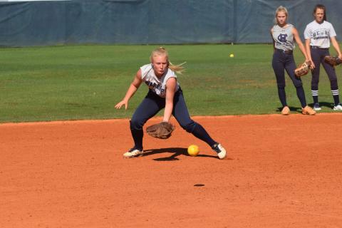 Katelyn Boman fields a ground ball during the Lady Warriors' practice session Wednesday morning at the WCHS softball complex. (Photo/Mark Turner)