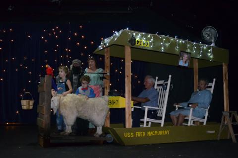 Cast members David McNeill White, who is also the director, Karen Loos, Liat Faver, Jack Molnar, Daniel White and Katie White all stand around the time machine that is featured. (Photo/Stephanie Hill)