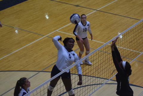 Rusty Dye rises up for a kill during the Lady Warriors' win over Stephens County last Thursday in Cleveland. (Photo/Mark Turner)