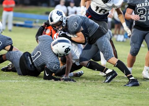 Zion McMullen, left, and Bryson Cronic, right, tackle Habersham Central's Zeke Whittington during the game last Friday night in Cleveland. (Photo/Staci Sulhoff)