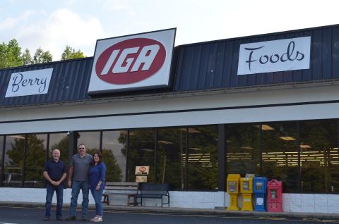 From left, Greg Adams stands with new owners of the IGA grocery store in Cleveland, Steve and Dana Berry. The former Adams Foods IGA was officially sold Sept. 1 and has been renamed Berry Foods IGA. (Photo/Stephanie Hill)