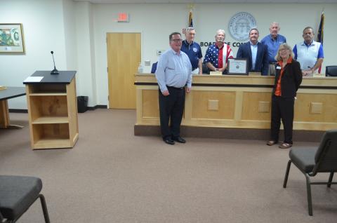Pictured are county commissioners with White County Community and Economic Development Director John Sell and Georgia Department of Community Affairs Region 2 Representative Kathy Papa. (Photo/Wayne Hardy)