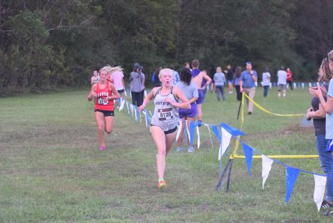 White County's Nealeigh Broadwell, right, pulls away from Rabun County's Molly Jo Wright during the final sprint to the finish line Tuesday at the Mountain Invitational at Unicoi State Park. (Photo/Mark Turner)