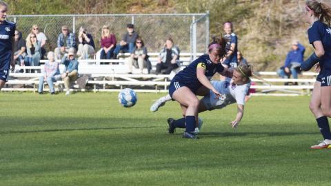 White County's Rachel Harris, left, and Cherokee Bluff's Alex Jahnke collide during the region matchup Tuesday afternoon at the Truett McConnell soccer complex in Cleveland. (Photo/Mark Turner)