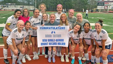 Anna Tatum, middle, celebrates with her teammates after setting the single season assist record Tuesady against Dawson County. Tatum had a pair of assists in the 10-0 win, gving her 14 on the season.(Photo/WCHS Soccer)