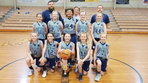 Members of the White County 10U basketball team are, front left, Bree Brookshire, Allie Fowler, Ansleigh Vandiver, Kinsley Hall, and Kara Watkins; middle row, Evelyn Knight, Adalyn Morgan, Naomi Nicely, Bailey Collins, and Camilla Anderson, back row, coaches Dexter Morgan, Courtney Morgan, and Chip Brookshire. (Photo/WCRD)
