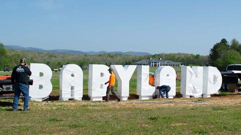 Workers from Owens Welding Inc. installing the letters along Appalachian Parkway. (Photos/ Ashley Blair)