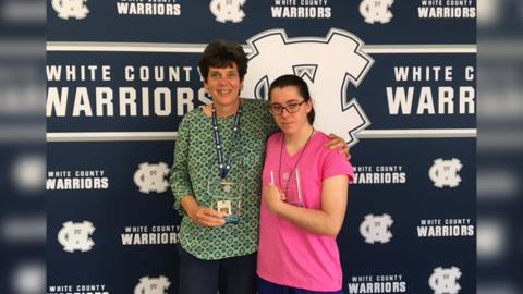 WCSS Nutrition Services Director Abby Rowland (left) and WCHS Senior Joey Cloer were recently recognized for their outstanding work in the Community Based Instruction program. Rowland received the Carter Cruce Business Partnership award and Cloer received the Carter Cruce Worksite Achievement Award. These honors are named after former student Carter Cruce whose work in the program inspired the award. (Submitted Photo)