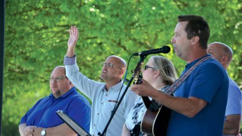 Pastors Michael Wilkes, Marc Turner and Burnetta Armour join Andy Vandiver in song. (Wayne Knuckles/WCN)