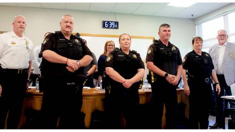 From left, Cleveland Police Chief Jeff Shoemaker, CPD Officers Rayner, Riebold, Addis, and Sims sporting bullet proof vests and President of North Georgia Mountains Lodge #112 Micheal Palmer at the city council meeting held on May 9. (Ashley Blair/WCN)