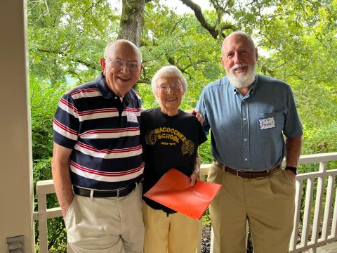 From left, Sonny (Paul) Watkins, Ann New Banke and Ike Stovall greet each other before the meeting.