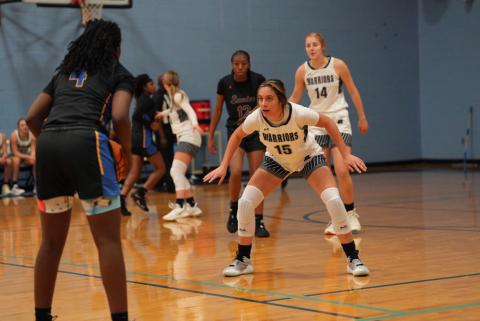 Naomi Roberts defends during the opening round win over Sumter, S.C. (Photo/Hilton Head HS Athletics)