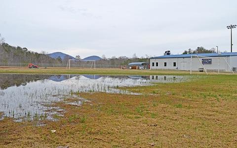 The practice fields at White County High School remain flooded Monday afternoon due to drainage issues. (Photo/Samantha Sinclair)