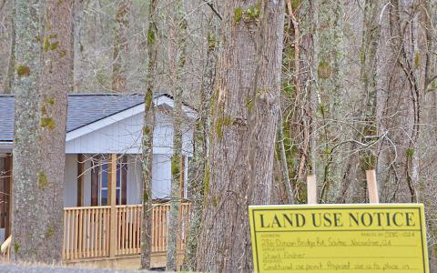 Many in the community have begun to dread seeing the yellow signs pop up that indicate someone is requesting a conditional-use permit for short term rental. (Photo/Linda Erbele)