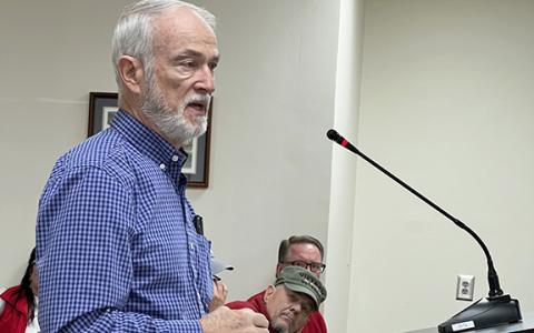 Larry Adams explains plans for a 47-unit subdivision on Claude Sims Road to the White County Commission. (Photo/Linda Erbele)