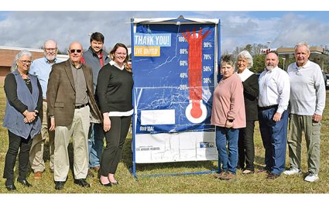 United Way of White County board members celebrating topping of the $80,000 fundraising campaign goal are, from left, Angie Jarrard, Mark Griffin, Dean Dyer, Nathan Eason, Taylor Burrell, Denise Loggins, Mary Isbell, Donald Harris and Gene White. (Photo/submitted)