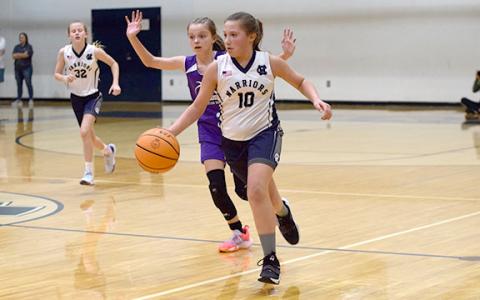 Ansleigh Vandiverdr dribbles by a Union County defender during the Class C 12U state championship game last Saturday at White County High School.  (Photo/Mark Turner)