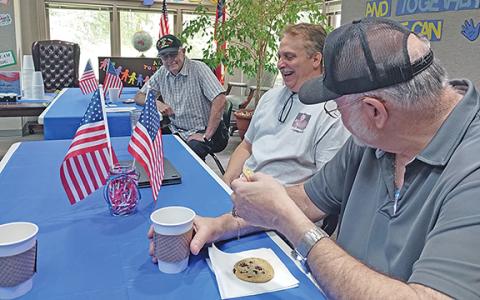 George Shipley, Randy Summers and Gary Leeds swap stories over refreshments. (Photo/Jessica Wood)