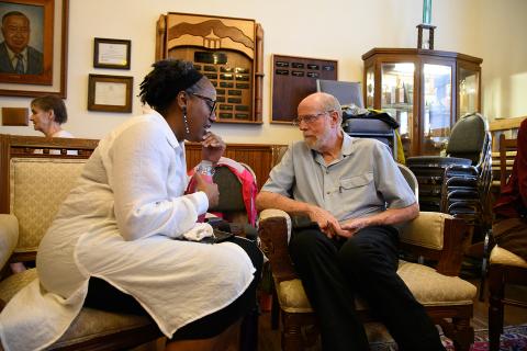 Audrey Davenport (left) speaks with Jim Johnston (right) during the ‘Think and Listen’ seminar at Sautee Nacoochee Cultural Center in honor of Juneteenth. The ‘Think and Listen’ session allowed patrons to voice their opinions and discuss matters about race, religion and other topics with an engaged partner. (Photo/Zach Taylor)