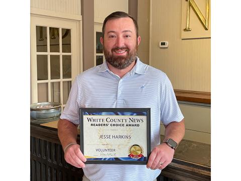 Jesse Harkins receives the 2023 Best Volunteer award.