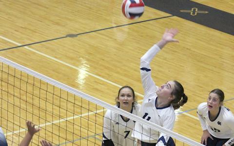Emma Kerley goes up for a shot during the opening set of the Lady Warriors' win over West Hall. (Phot0/Mark Turner)