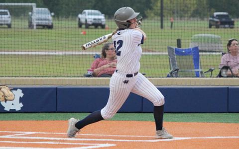 Valerie Bailey rips a walk off single Monday afternoon to end the Lady Warriors' 10-2 win over Lumpkin County. (Photos/Mark Turner)