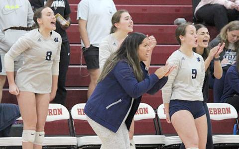 White County's Kate Blair, left, head coach Yarixa Oakes, Emma Kerley and Jalyn Allison celebrate during the Class AAA state tournament match at Hebron Christian Saturday in Lilburn. (Photo/Mark Turner)