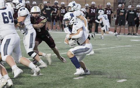 Ryan Fowler rushed for 203 yards and had two  touchdowns in the Warriors' region win over Dawson County.  (Photo/Mark Turner)
