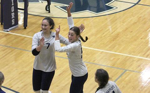 Jenna Pratt, left, and Linsey Burke celebrate during a match.  (Photo/Mark Turner)
