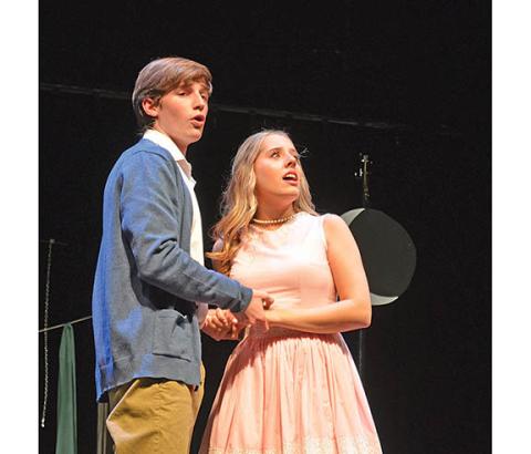 Sebastian Wiley and Nealy Webster sing “Soon It’s Gonna Rain” as Matt and Luisa in ‘The Fantasticks.’ (Photo/Samantha Sinclair)