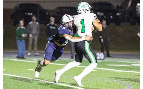 WCHS linebacker Jon Scott, left, brings down Pickens' McCord Purdy during the first half. (Photo/Staci Sulhoff)