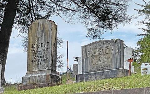 The headstones of Eugene Stanhope Jarrett and his mother Lucy after cleaning. These stones will continue to lighten over time. (Photo/Cindy Foster Grace)