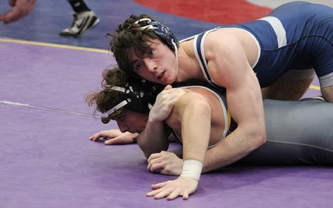 White County's Christian Keheley, top, controls Villa Rica's Mason Jones during his run to the 165-pound tournament title. (Photo/Mark Turner)
