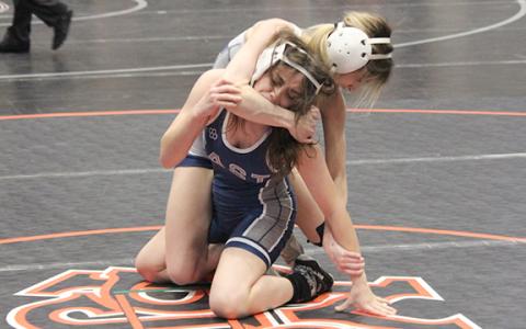 WCHS junior Ollie Weiland takes down East Jackson's Seanna McCarthy during a match in the 110-pound division at the Chestatee event. (Photo/Mark Turner)