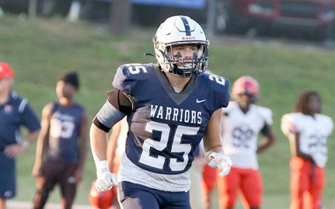 Bryce Dockery, above, and the Warriors will play East Hall in a spring game in May. (Photo/Staci Sulhoff)