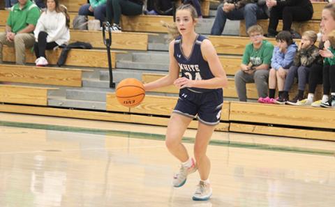 Zoe Burkett, above, and the Lady Warriors take on No. 2 Wesleyn in region showdown next Tuesday in Cleveland.  (Photo/Mark Turner)