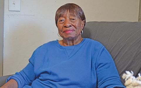 Betty Jenkins sits in the home her husband built in the Bean Creek community. (Photo/Samantha Sinclair)