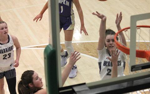 Kylie Watkins, shown putting up a shot during the first half of the region tournament game, scored in the final seconds of the game to give the Lady Warriors' a 45-43 win over Lmpkin County in the opening game of the Region 7-AAA tournament Tuesday in Jasper. The win gives the team a spot in the region semifinals along with an automatic berth in the state tournament. (Photo/Mark Turner)