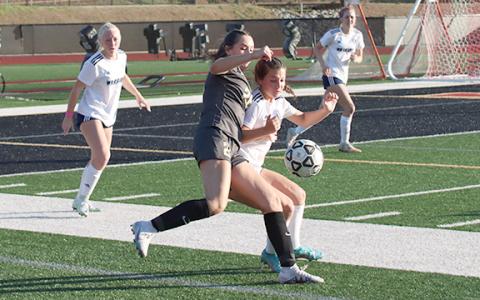 Lilly Gann, right, is one of several starters back from the Lady Warriors' Elite Eight team last spring. (Photo/Mark Turner)