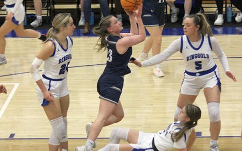 Mya Yeh goes through three Ringgold defenders on the way to the basket Tuesday during the first round of the Class AAA state tournament. (Photo/Mark Turner)
