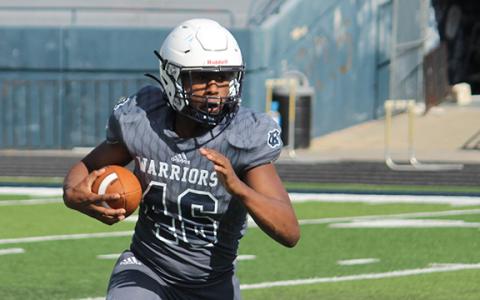 Noel Lammers looks for some running room during an intrasquad scrimmage last week. (Photo/Mark Turner)