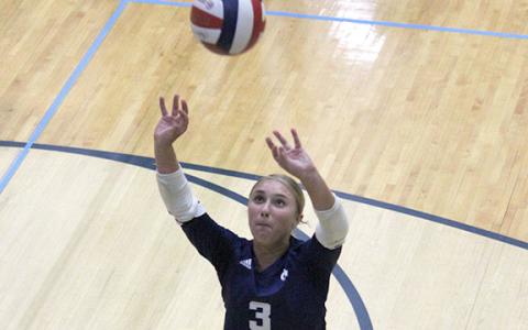 Baylie Rae Vandiver makes a pass Tuesday during a win over East Hall.  (Photo/Mark Turner)