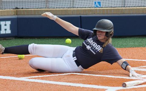White County's Cierra Bailey slides and reaches back to touch the plate Monday morning's practice session at the softball complex. (Photo/Mark Turner)
