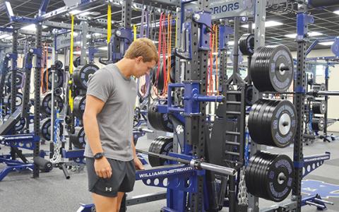 WCHS senior Dade Anderson checks out the equipment in the new weight room  during open house Tuesday afternoon at the high school. (Photo/Samantha Sinclair)