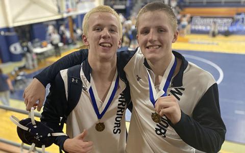 Alex Johnson, left, and Bryson Howe won individual titles at the Granite City Scramble last weekend in Elberton. (Photo/WCHS Wrestling)