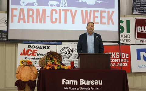 White County Farmers Exchange President Gilbert Barrett gives a speech thanking farmers for their work. (Photo/Eric Tiongson)