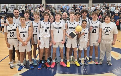 The White County Middle School basketball teams  picked up a pair of North Georgia Mountain League championships last week during the post-season tournament on the WCMS campus. The Warriors' eighth-grade squad posted a 51-40 victory over Union County to earn the league title.  (Photo/Mark Turner)