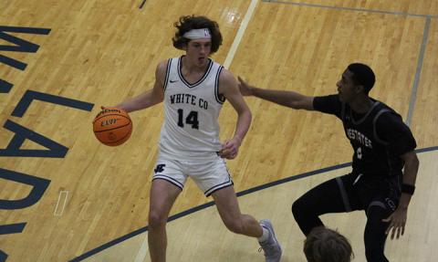 After missing seven games with a hand injury, Blayne Gunter scored 25 points in the Warriors' matchup with North Hall last Friday in Cleveland. 